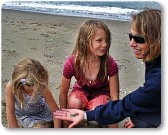 Mom and kids finding sea glass