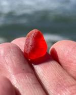 Wow, red beach glass!