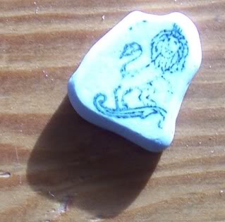 Beach Pottery Shard with Lion