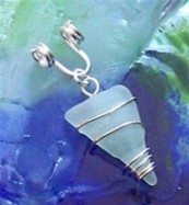 Light blue sea glass wire wrapped sterling silver pendant