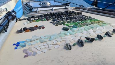 I started assembling some black sea glass with wire to hang. I would like to sell and get evaluated....thank you