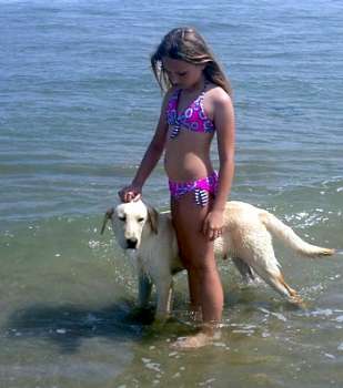 lobitos peru beach dog and Arianna