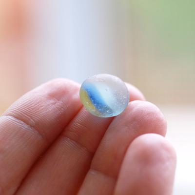 A sea glass marble