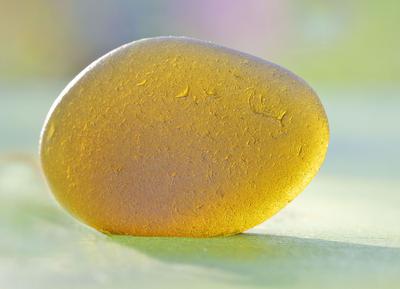 Sea Glass looks golden-yellow when held to light