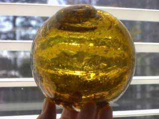 Glass Fishing Floats - Grapefruit-size Honey Amber Japanese Long Line Cod float with thousands of bubbles, very old glass.