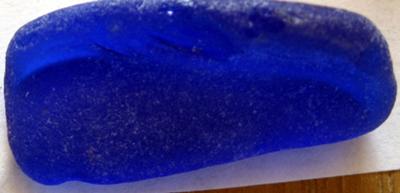 Cobalt sea glass 2 inches long, thick; closeup