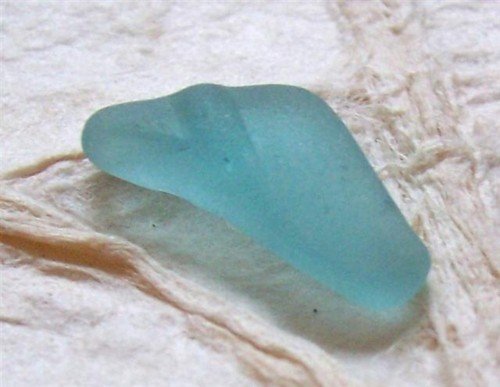 medium turquoise or light blue sea glass