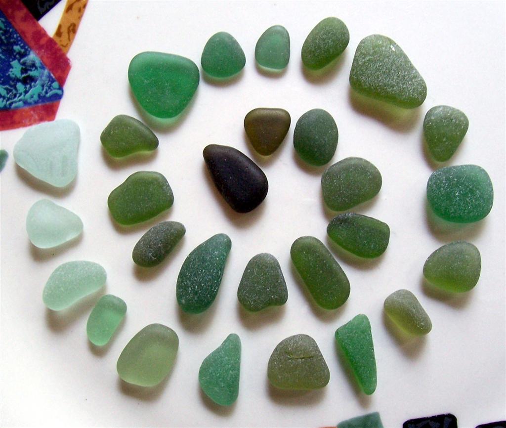 This spiral of green hues illustrates the variety you might find in green or turquoise sea glass.