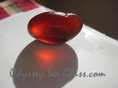 The wet look of  deep red sea glass