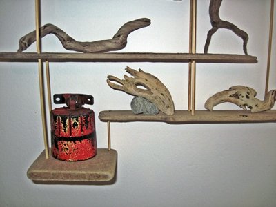 Bottom shelves driftwood and beach finds