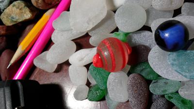 Orange swirl sea glass and marbles!