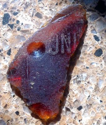 Large piece of brown sea glass need ID of manufacturer