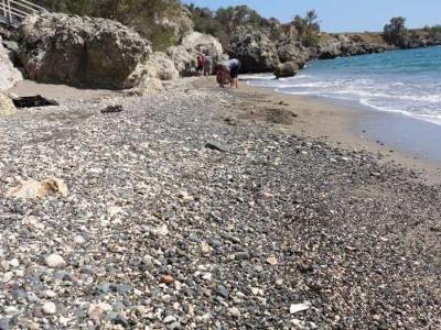 People collecting sea glass at Guantanamo Sea Glass Beach