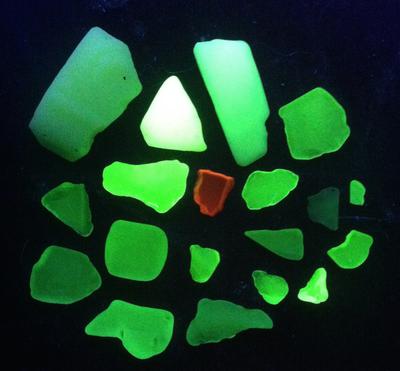 Mostly Green UV glass with one red
