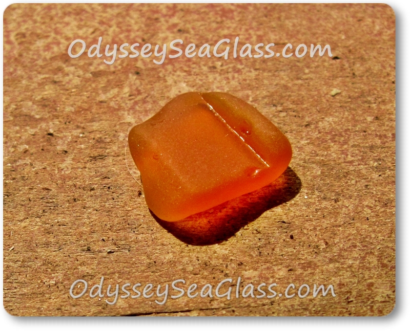 My first orange sea glass - from the Chesapeake Bay first side