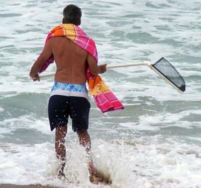 Using the sea glass scooper at Seaside CA